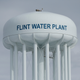Illustration for article titled Top Michigan Health Official on Trial for Flint Water Crisis Upgraded to Fancy New Job